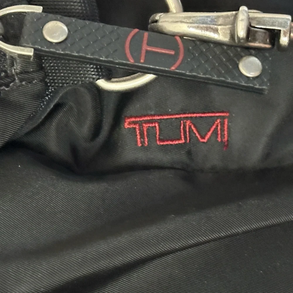 Vintage Tumi laptop/crossbody bag. Black with red lining, great find!